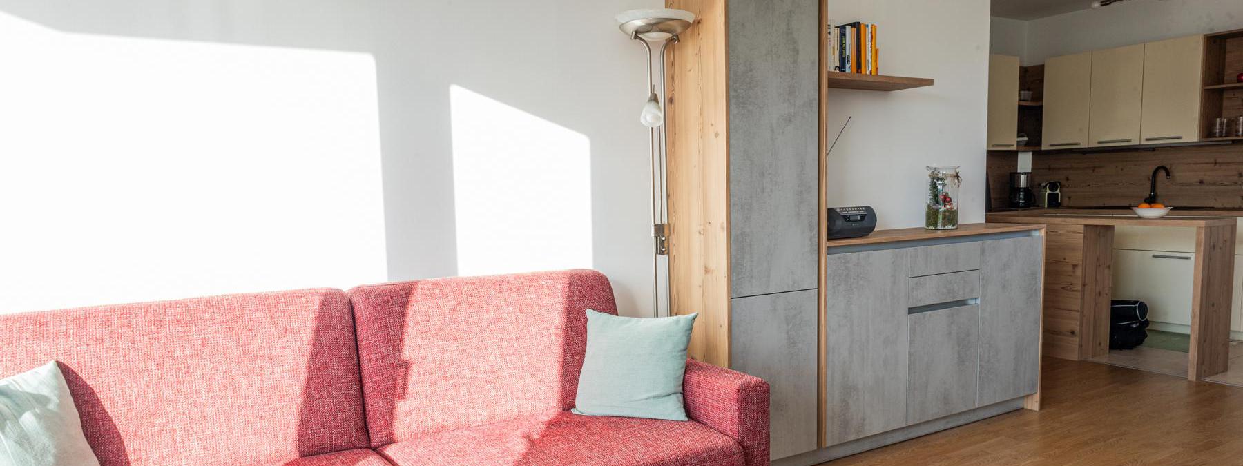 dankuechen-neunkirchen-call-to-action-wohnzimmer-kueche-im-hintergrund